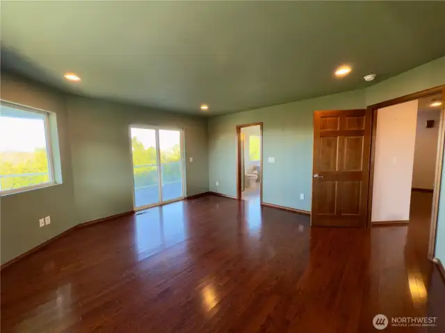 Primary leading into full bath