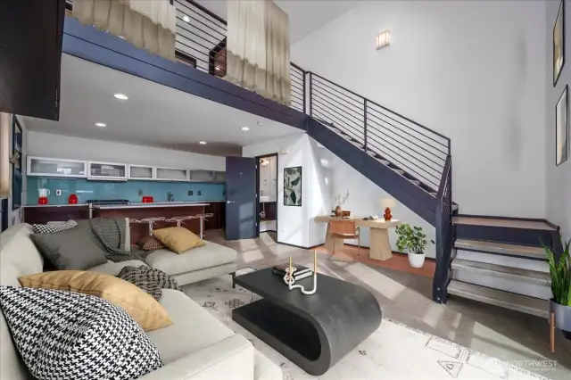 Great Room to Kitchen and door to 1/2 Bath