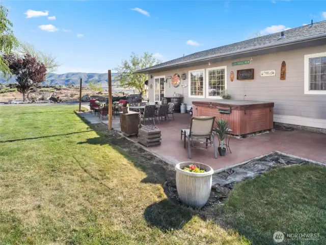 Back of home and hot tub.