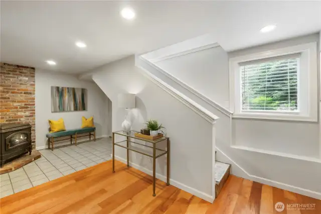 Lower level w/ fireplace.