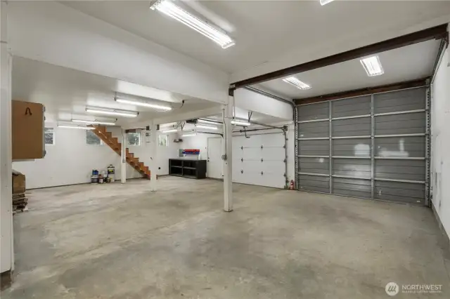 Huge shop area w/ pellet stove & loft area.  10x12 RV door and a 10x7 garage door.
