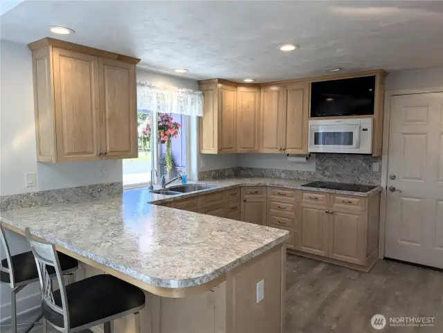Spacious Kitchen with loads of cabinets rollout shelves  & organizers. #1250 Northcliff Rd, Shelton, WA 98584