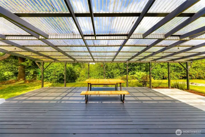 Wonderful covered deck off of the living room.