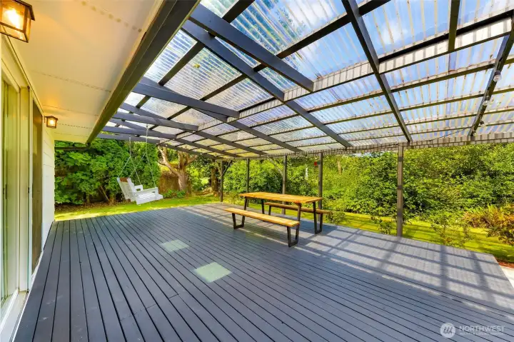 Well protected back deck to enjoy the peaceful sounds of the Samish river