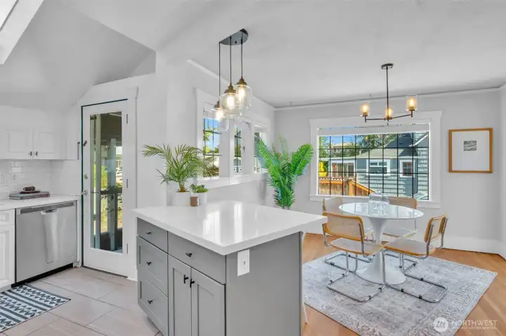 Back door leads to side yard and detached garage.