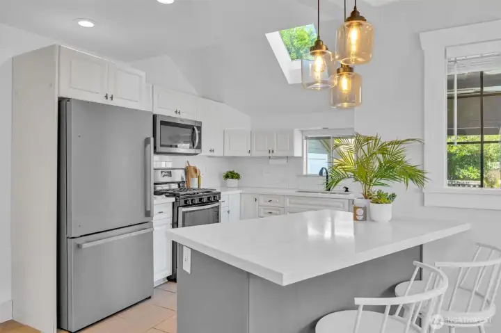 Updated kitchen with gas stove.