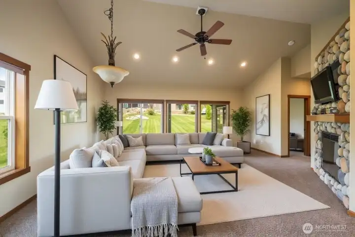 Living room (virtually staged) with slider to patio