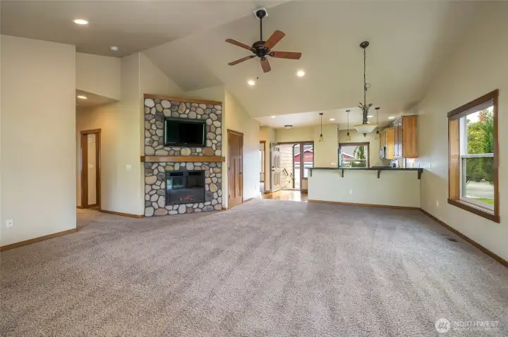 Rock fireplace is focal point of living room