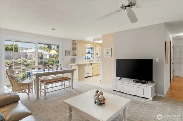 Open to the kitchen and patio