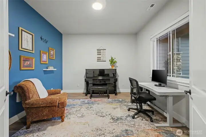 Just off the foyer, this bright office works beautifully as a home office today and easily transforms into a formal dining room for entertaining tomorrow. A flexible space that adapts to how you live.