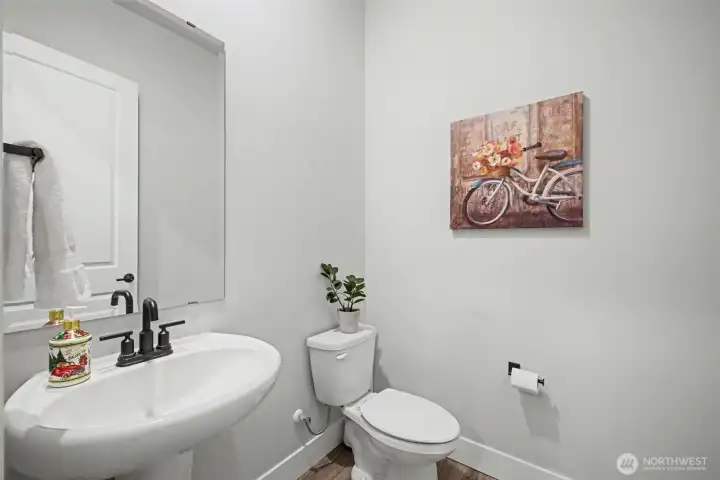 Powder room off of the living room.