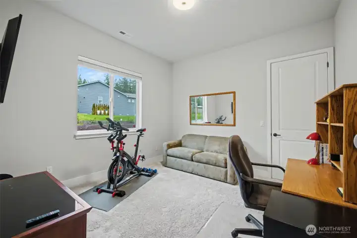 Second guest room also with walk in closet.