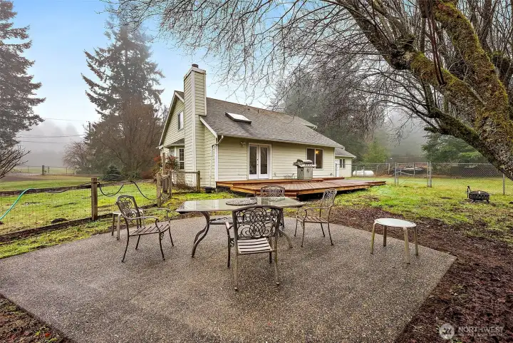 Poured patio in the fully fenced backyard for main house