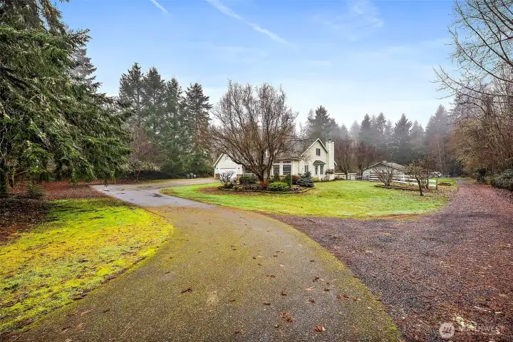Entry to property.  Drive to the right leads to ADU and Barn/Office
