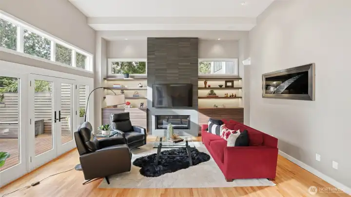 Walls of glass bring the outdoors in to this inviting space.