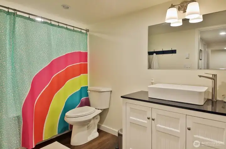 A full bath adds convenience to the lower level.