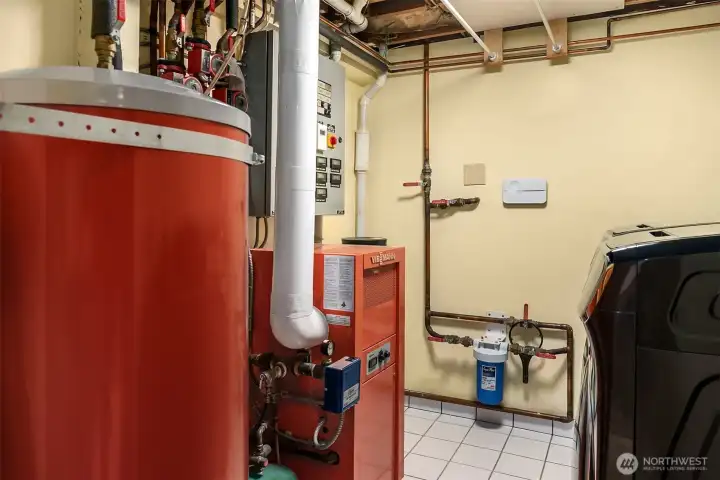 State of the Art Boiler & Radiant Heat System, Hotwater Tank, Whole House Water Filtration System & Laundry Room