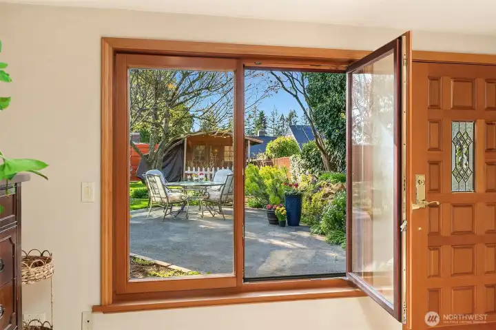Lower Level Bedroom #5 Features Exterior Door to Outdoor Living Spaces & Gardens