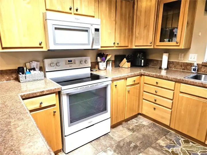 Efficient kitchen with a large skylight.