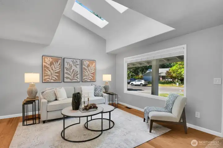 Delightfully appointed Living Room, Bamboo Floor (throughout), Skylights, custom Louver Blinds (throughout)