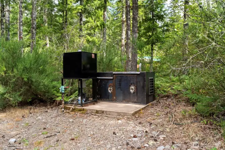 The Kabota generator provides the electricity, the community well, inground propane tank with a tankless porpane on-demand water heater together provide the comforts of home while enjoying the relaxed wilderness lifestyle.