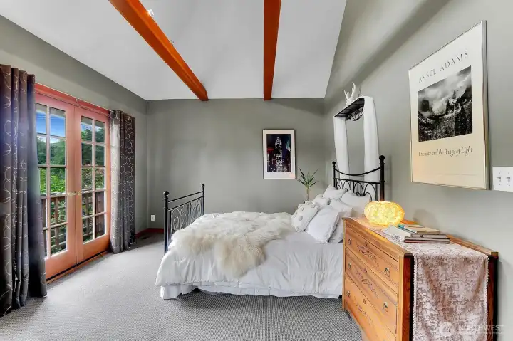 Big primary bedroom with French doors Big primary bedroom with French doors