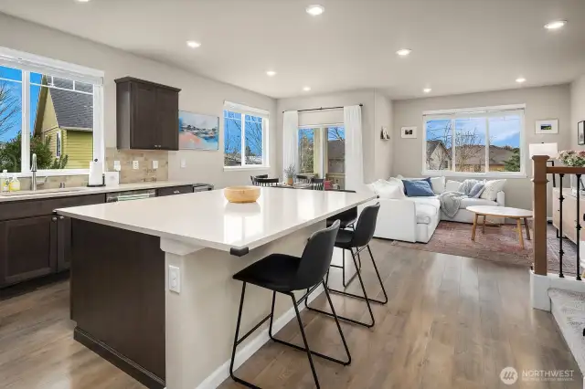 Kitchen, living area and dining areas.