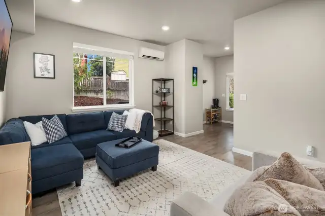 Street entrance opens to Daylight basement level of this 3 level home. This lower level features a large bedroom and full bathroom - an ideal space for guests that offers privacy and convenience.