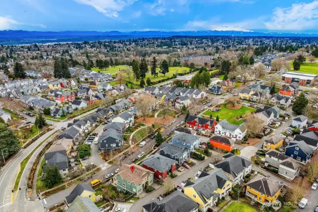 View facing South East features community and the Cascade mountain range.
