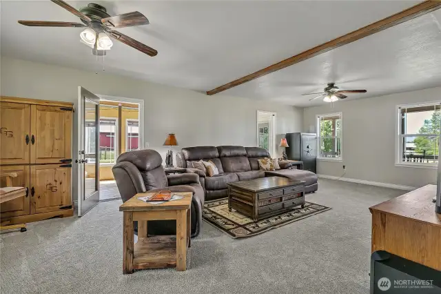 New carpet and paint! Cozy fireplace is nestled in the corner of the Living Room.