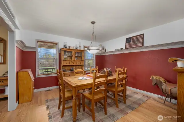 Large dining room can be accessed from front foyer or kitchen.