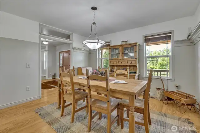 Large dining room can be accessed from front foyer or kitchen.