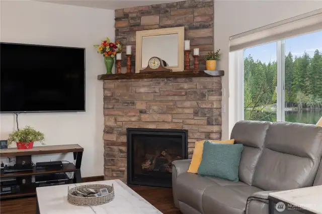 Natural gas fireplace with remote.
