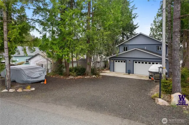 Driveway with RV and boat parking PLUS a 3 car garage!
