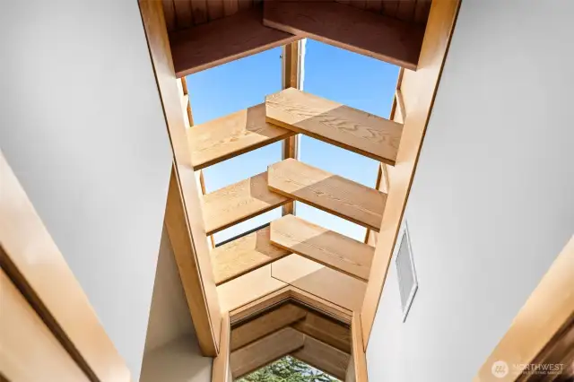 interlocking woodwork frames the skylights, showcasing exceptional craftsmanship and architectural artistry