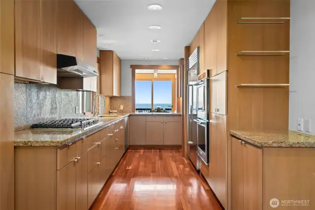 Custom designed kitchen featuring abundant storage and thoughtfully crafted cabinetry.