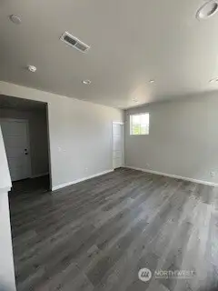 Media room main floor with 3/4 bathroom and storage example only