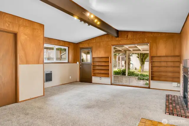 Familyroom with wood burning fireplace