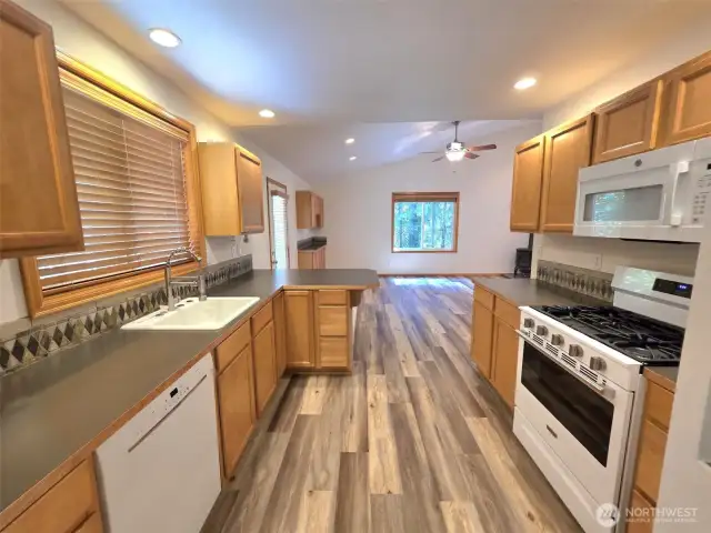 Brand new floors, stove, fridge.