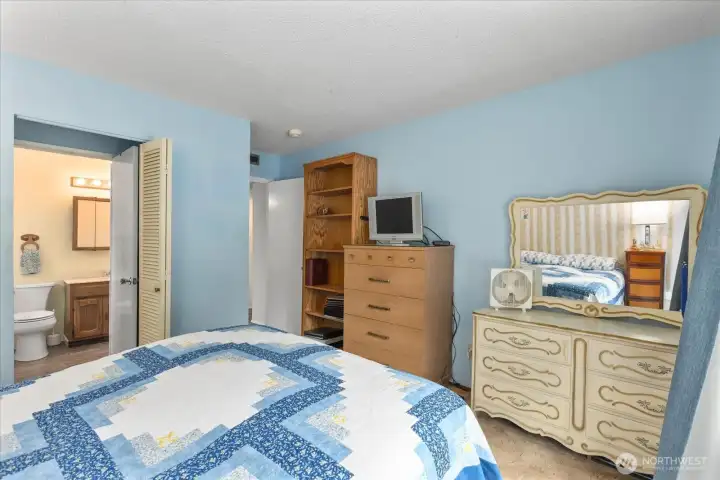 Main bedroom features a walk-in closet and offers direct access to the bathroom.