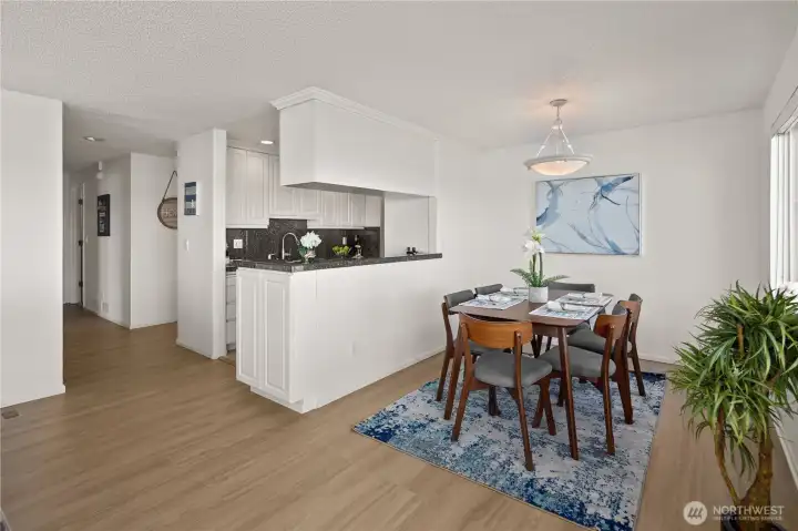 Looking from the living room towards the dining and kitchen spaces