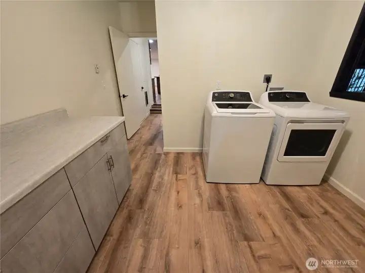 Oversized Utility Room with Cabinets