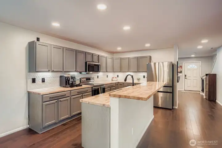 Spacious open concept kitchen (looking back at front living room entrance)
