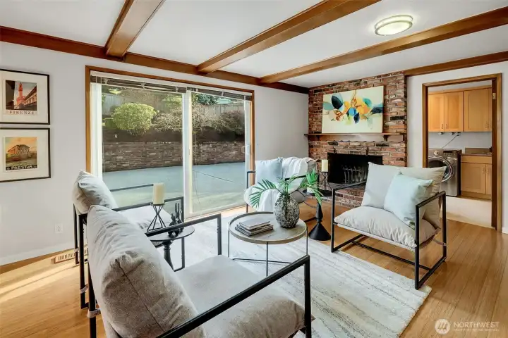 Family room with direct access to the patio, and garage.