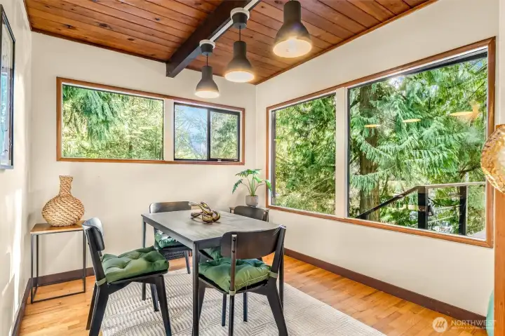 Enjoy gathering in the dining room just off the kitchen.