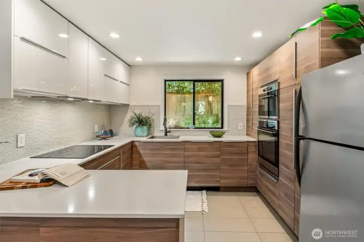 The new kitchen is a dream come true for any aspiring chef, with plenty of extra storage and room to work on their culinary creations!