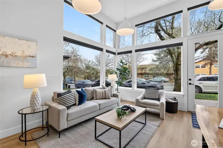 Light and Bright with Automatic Upper Shades and 13 Foot Ceilings!
