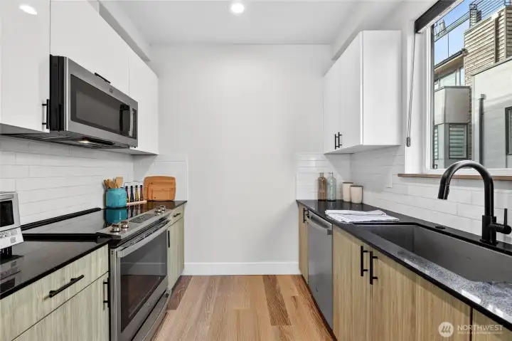 High Quality Cabinets and Quartz Counters.