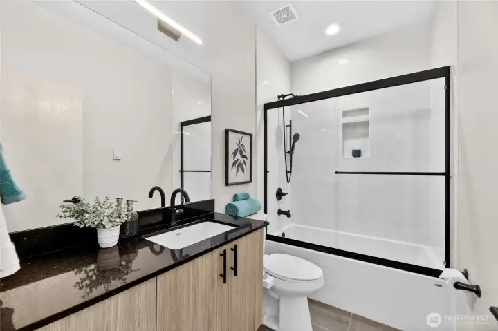 Freshly Painted, Full Bathroom with Quartz and High Quality Tile and Finishes.