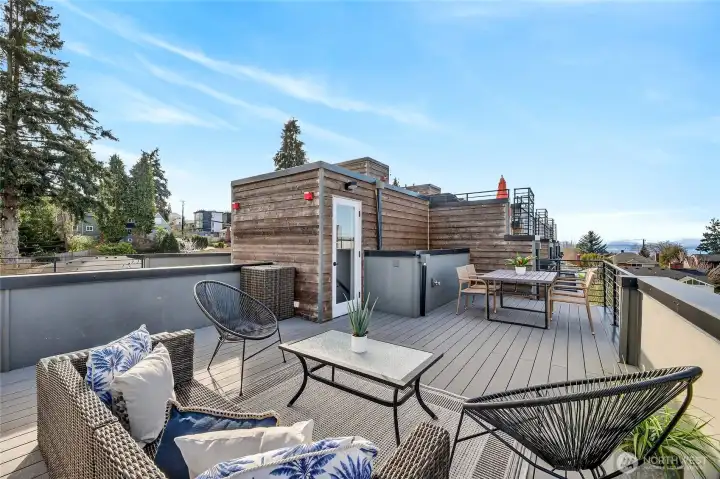 Watch the Sun Set to the West over the Sound and Mountains.